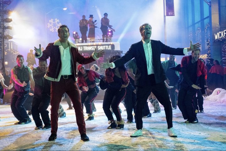 Ryan Reynolds and Will Ferrell sing and dance in Spirited.