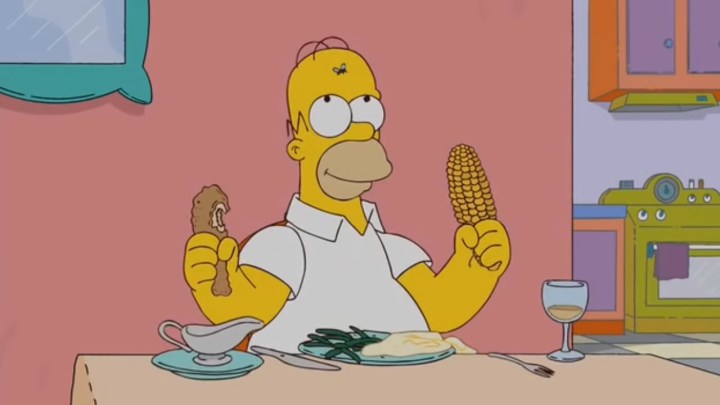 Homero con una mosca muerta en la cabeza en "Los Simpson".