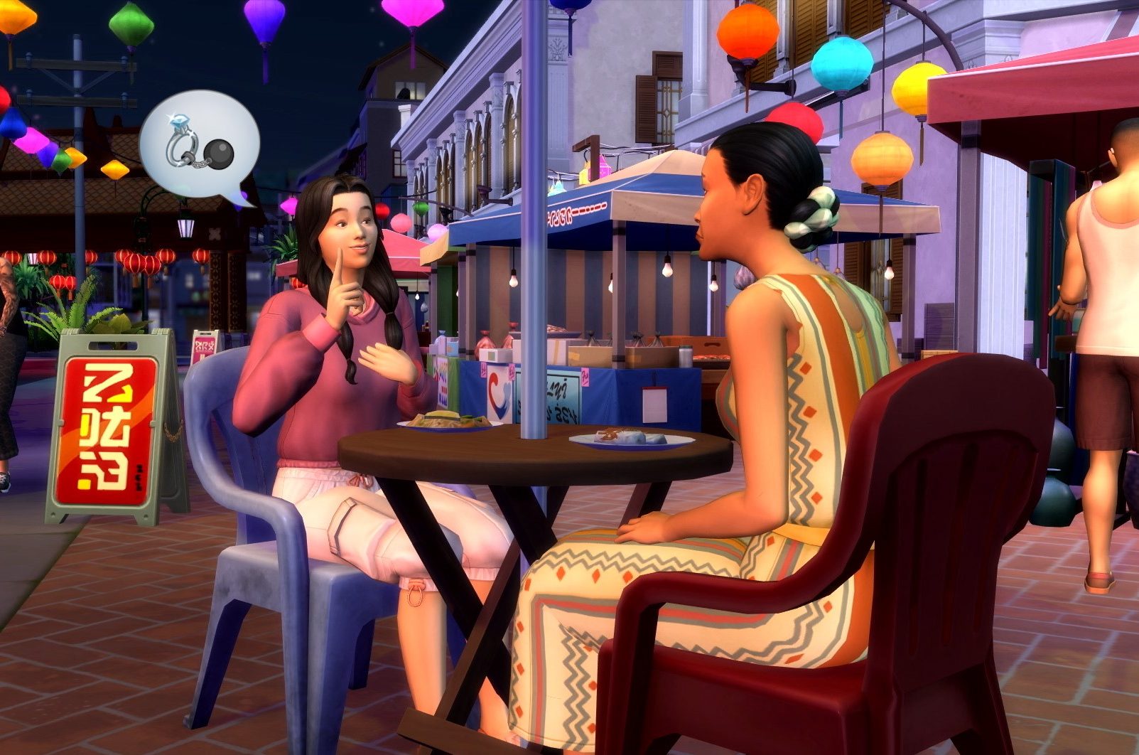 Two Sims sit at an outdoor cafe table at night, chatting.