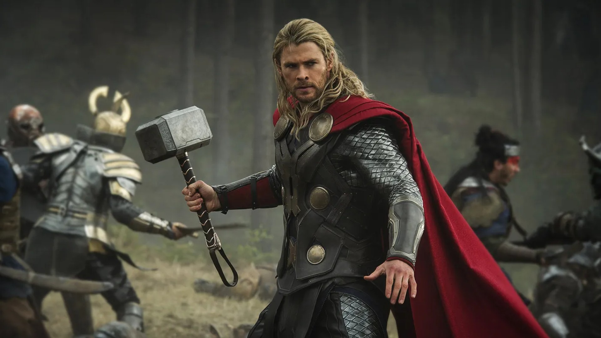 Chris Hemsworth's Thor poses with his hammer.
