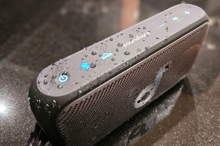 Soundcore Motion 300 covered in water droplets.