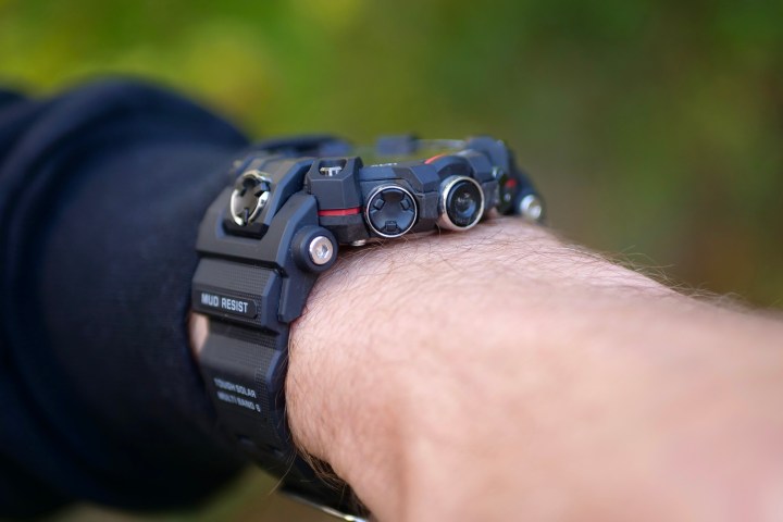 A person wearing the G-Shock GW-9500 Mudman, showing the buttons.