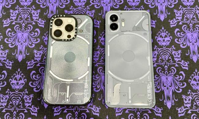 iPhone 15 Pro in Casetify Nothing Case (left) and a Nothing Phone 2 side-by-side.