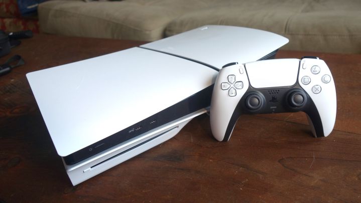 A PS5 sits on a table.