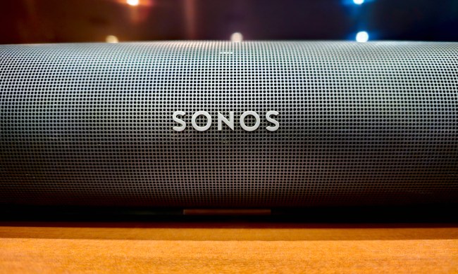 Close up of Sonos logo on a Sonos Arc soundbar.