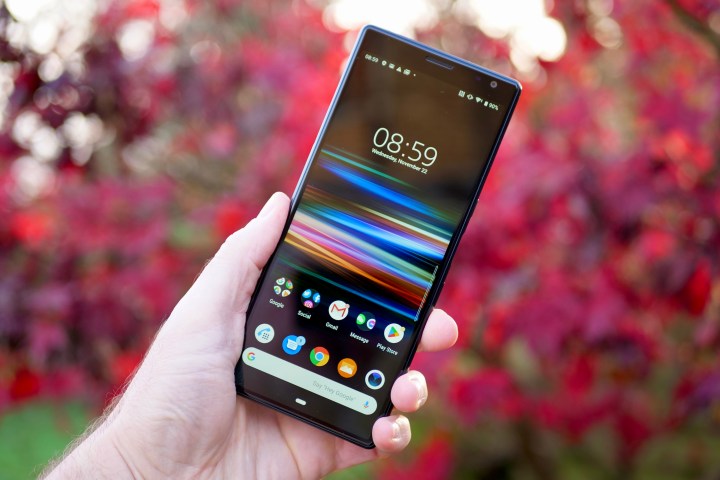 A person holding the Sony Xperia 10 Plus, showing the screen.