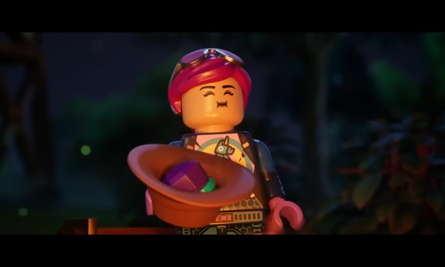 A lego character holding a basket with a fruit.