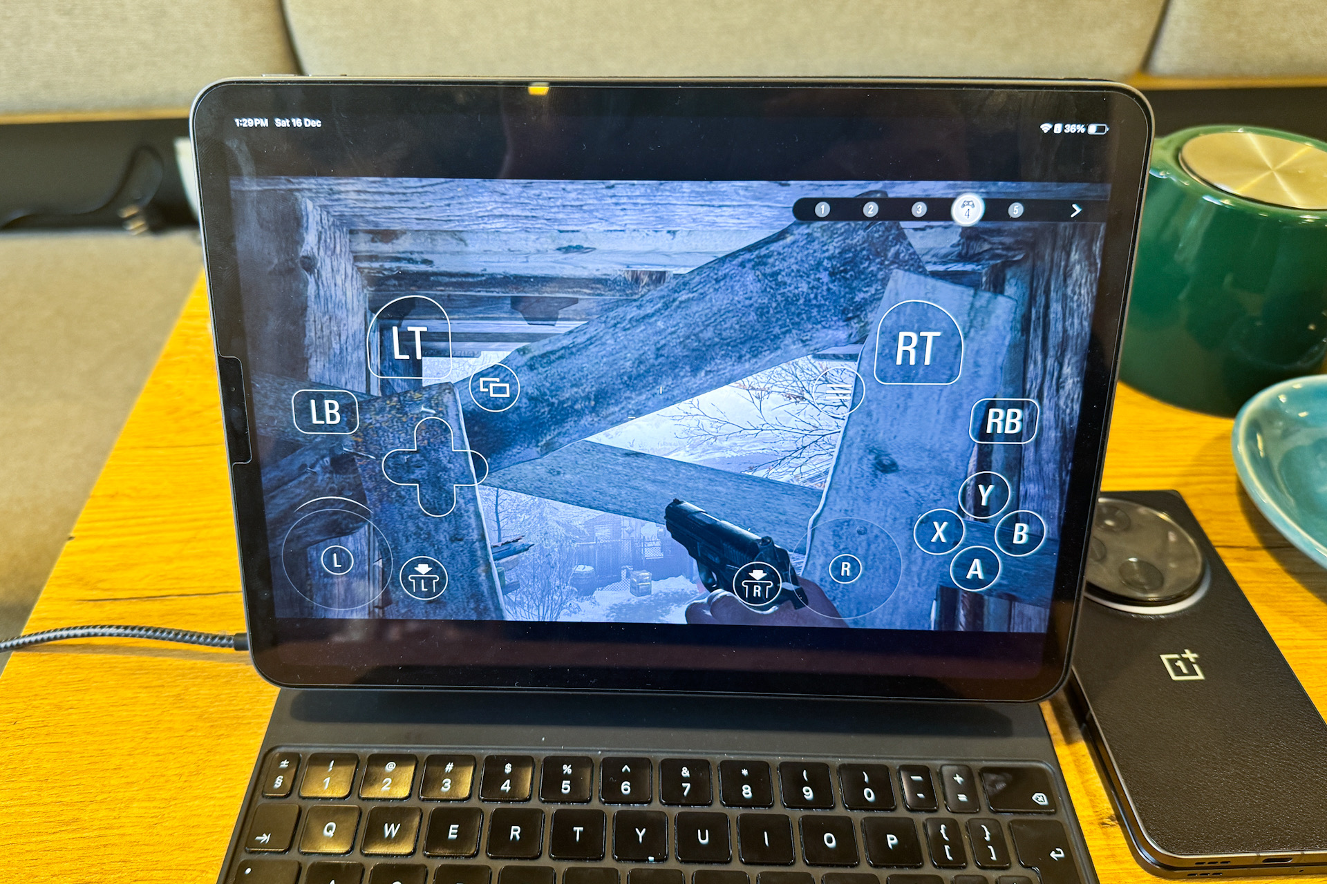 On-screen controls in Resident Evil Village on iPad Pro.