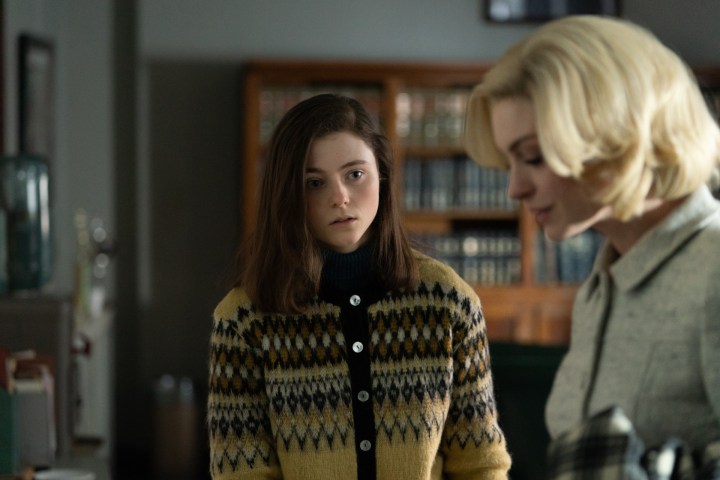 A adolescent woman looks at addition woman in Eileen.