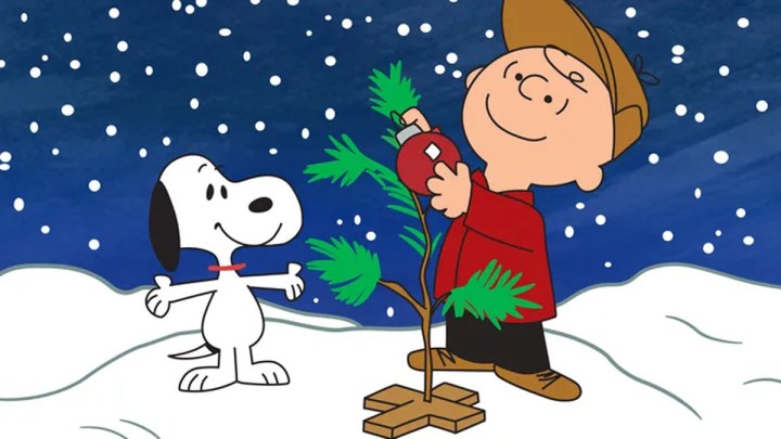 Snoopy and Charlie Brown adorn a Christmas timberline in A Charlie Brown Christmas.