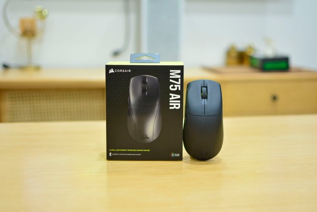 The Corsair M75 Air wireless gaming mouse standing next to the retail box.