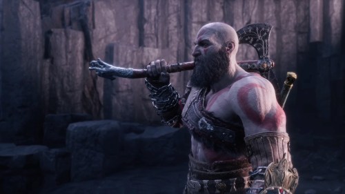 Kratos carries an axe out of Valhalla in God of War Ragnarok Valhalla