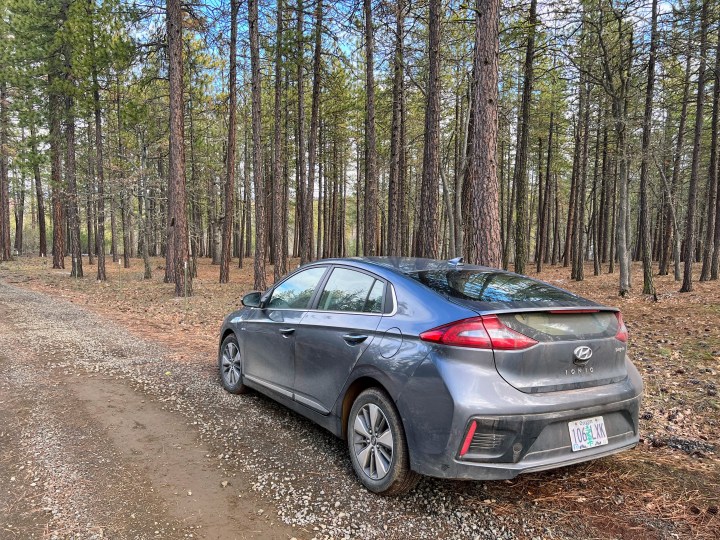 The author's 2019 Hyundai Ioniq PHEV is pulled over to the side of a dirt road in the woods.