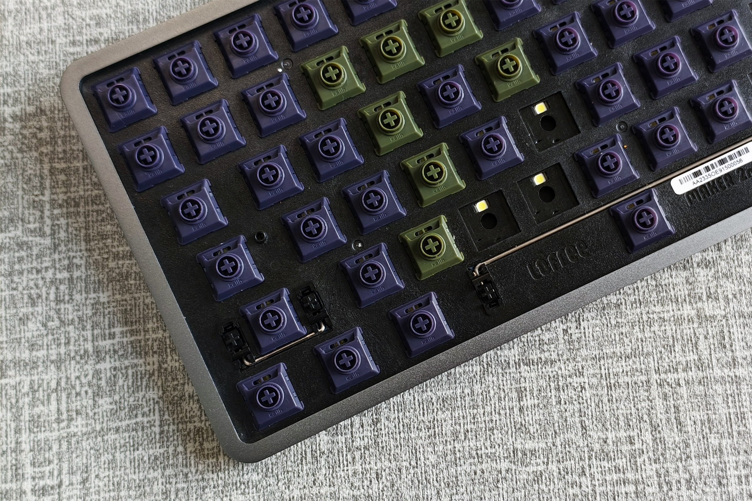 Lofree Flow Kailh Phantom tactile and Ghost linear low profile mechanical keyboard switches on a desk.