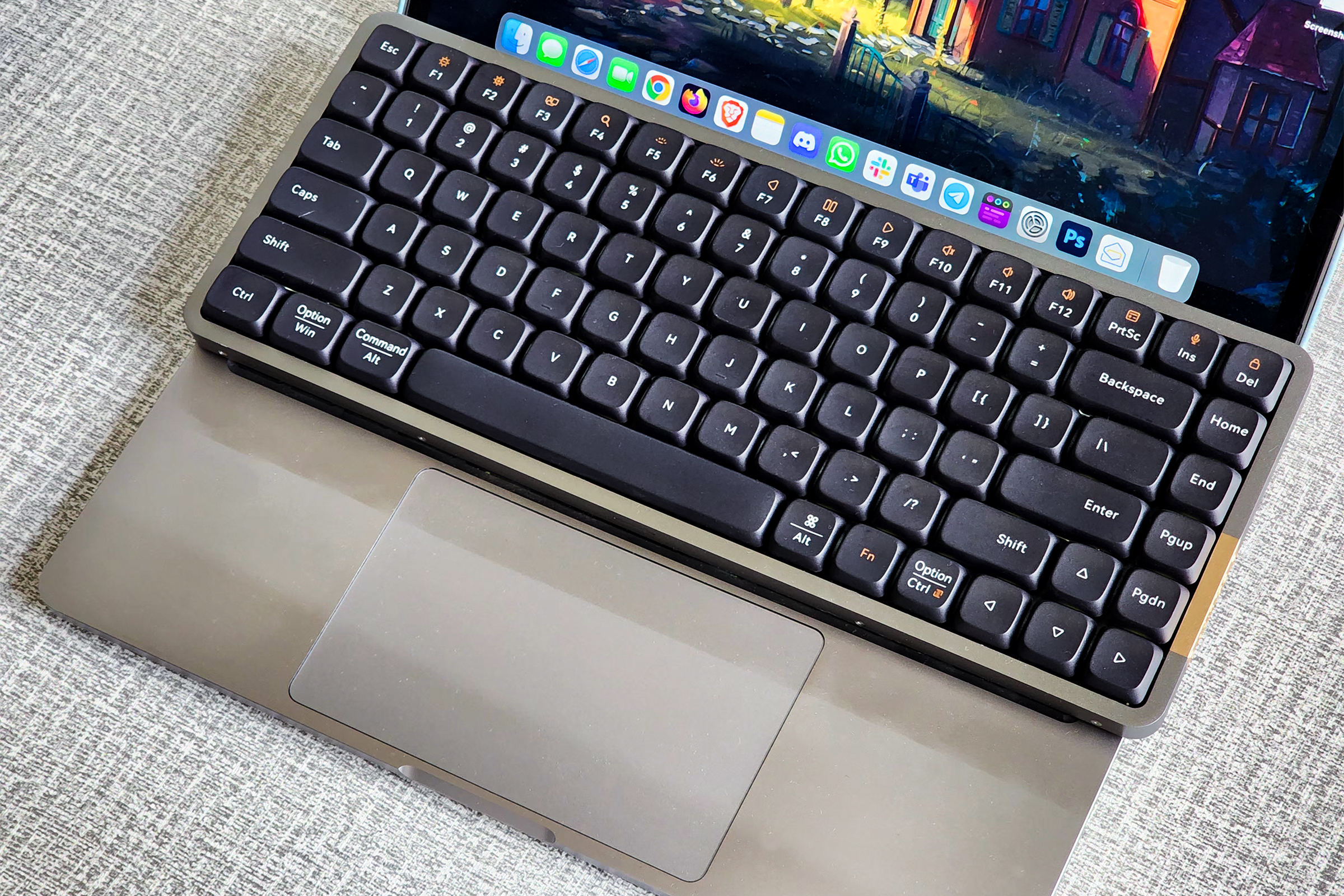 Lofree Flow low-profile mechanical keyboard on a 13-inch Apple MacBook Pro.