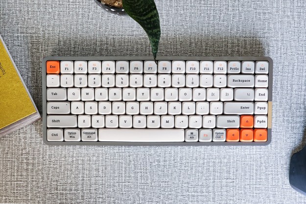 Lofree Flow low profile mechanical keyboard with Kailh switches and white retro styles dye-sub pbt keycaps on a desk.