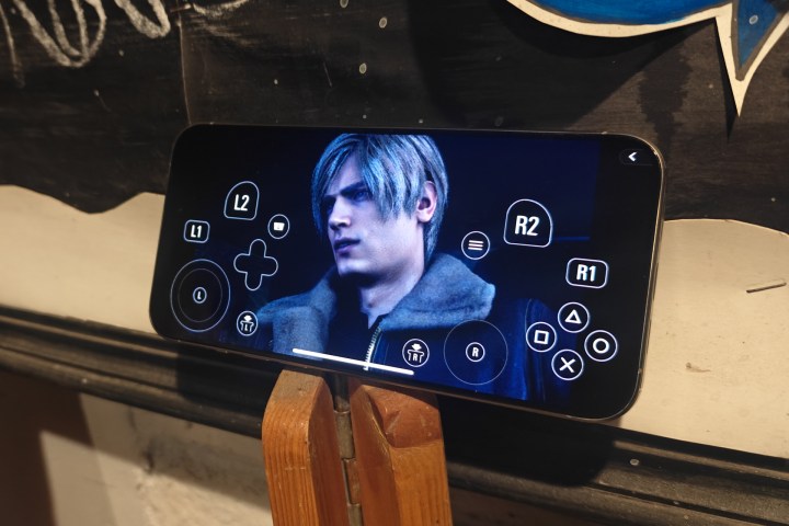 On-screen controls in Resident Evil 4 on iPhone 15 Pro Max.