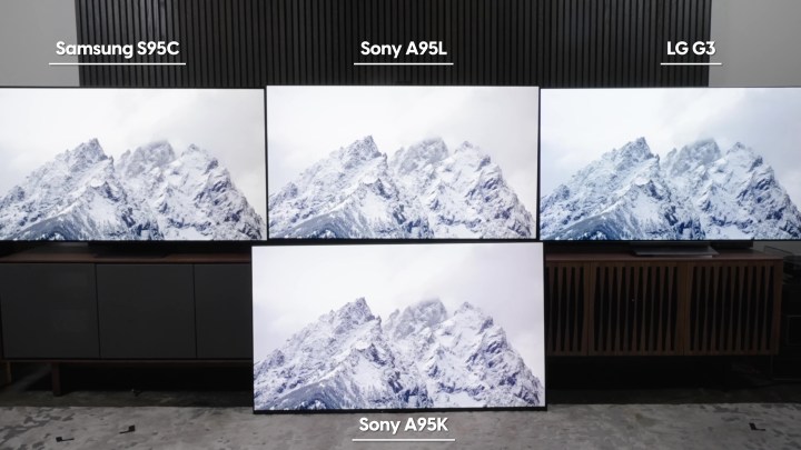 Snowy white moutain peaks agains a white cloudy background compared on a Samsung S95C, Sony A95L, LG G3, and Sonly A95K TV. 