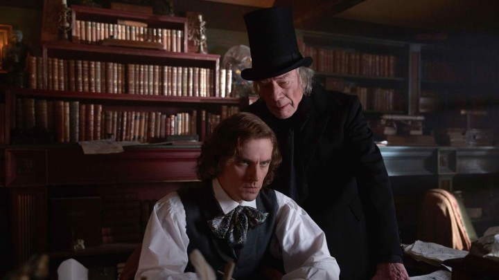 Dan Stevens and Christopher Plummer in The Man Who Invented Christmas.