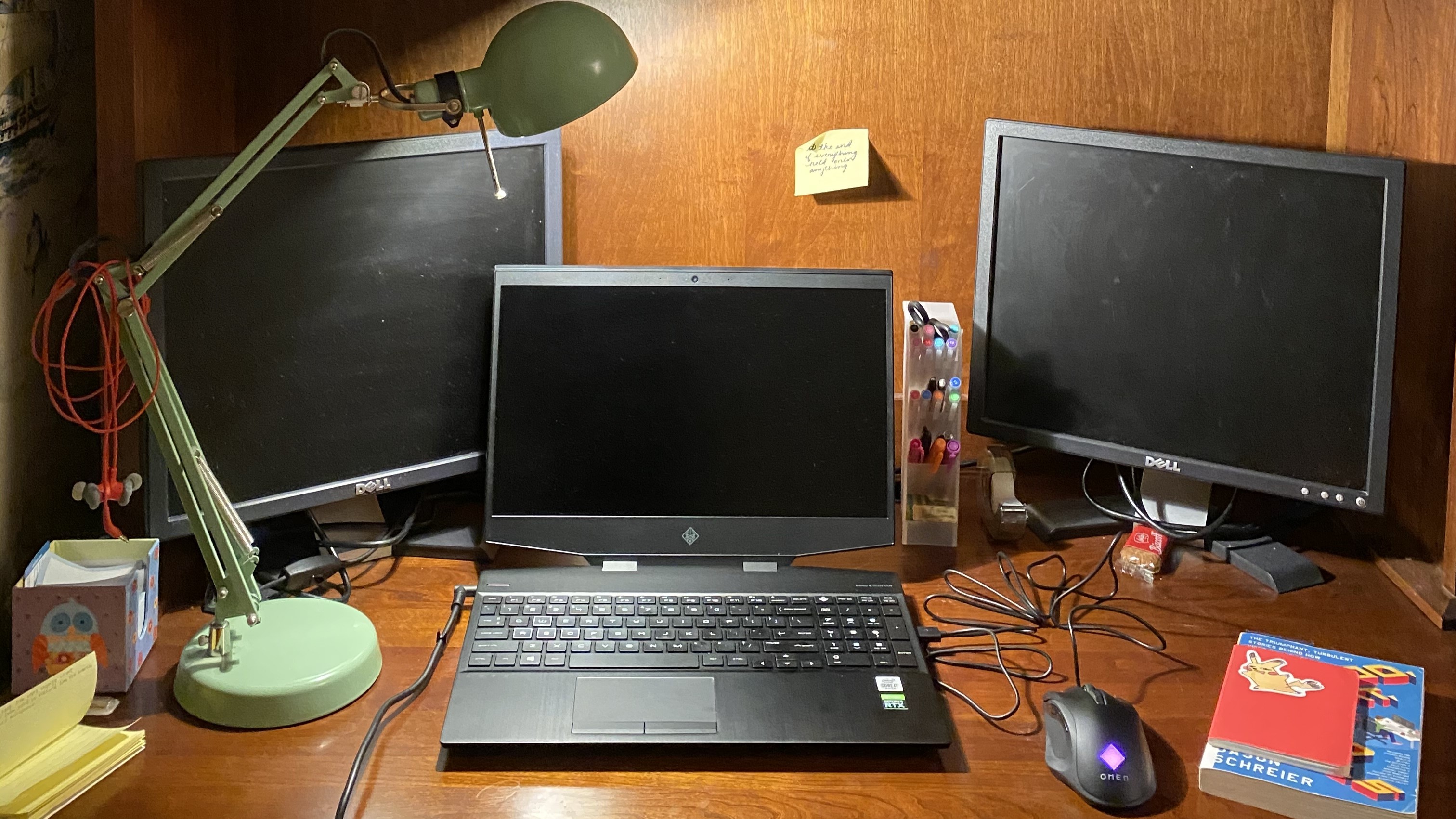 HP Omen in between two ancient Dell monitors with Omen mouse