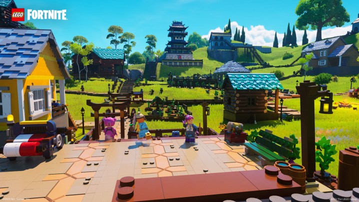 Characters mill around a village in Lego Fortnite.