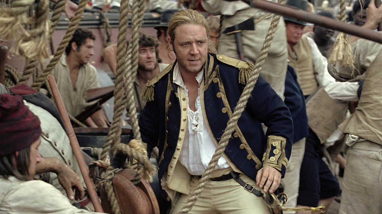 Russell Crowe in period clothing on a boat in Master and Commander: Far Side of the World.