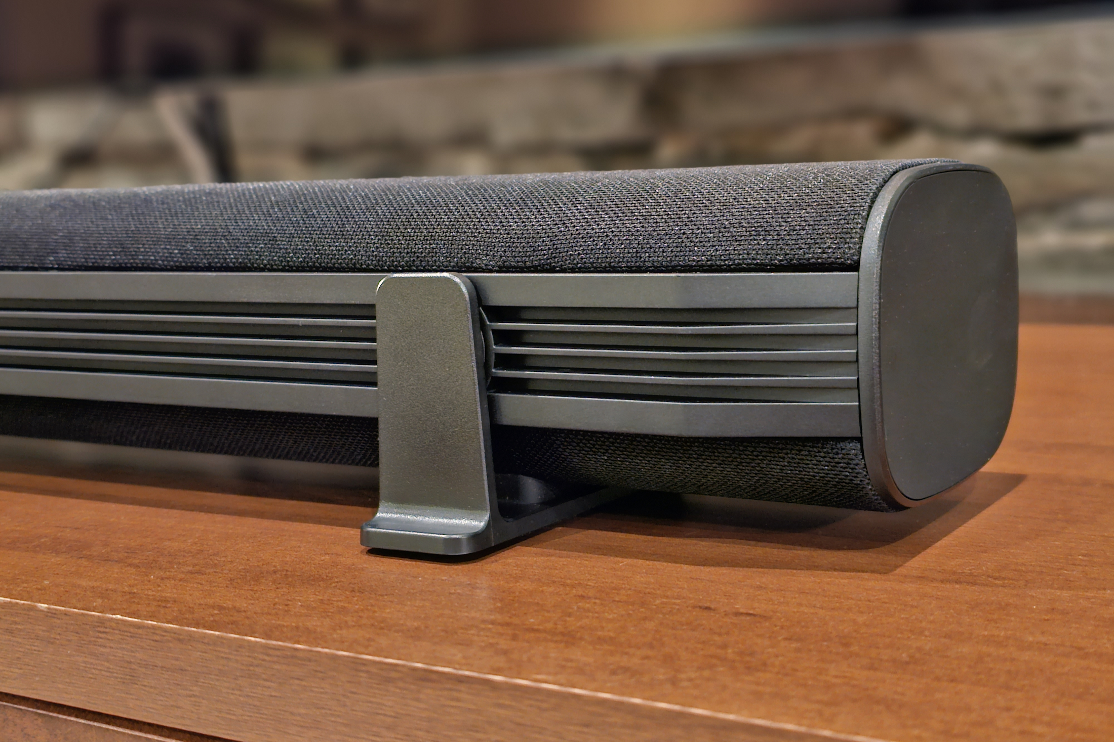Platin Audio Milan 5.1.4 soundbar rear panel with rubber foot attached.