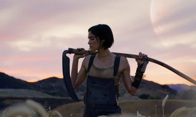 A woman poses as dusk approaches in Rebel Moon.