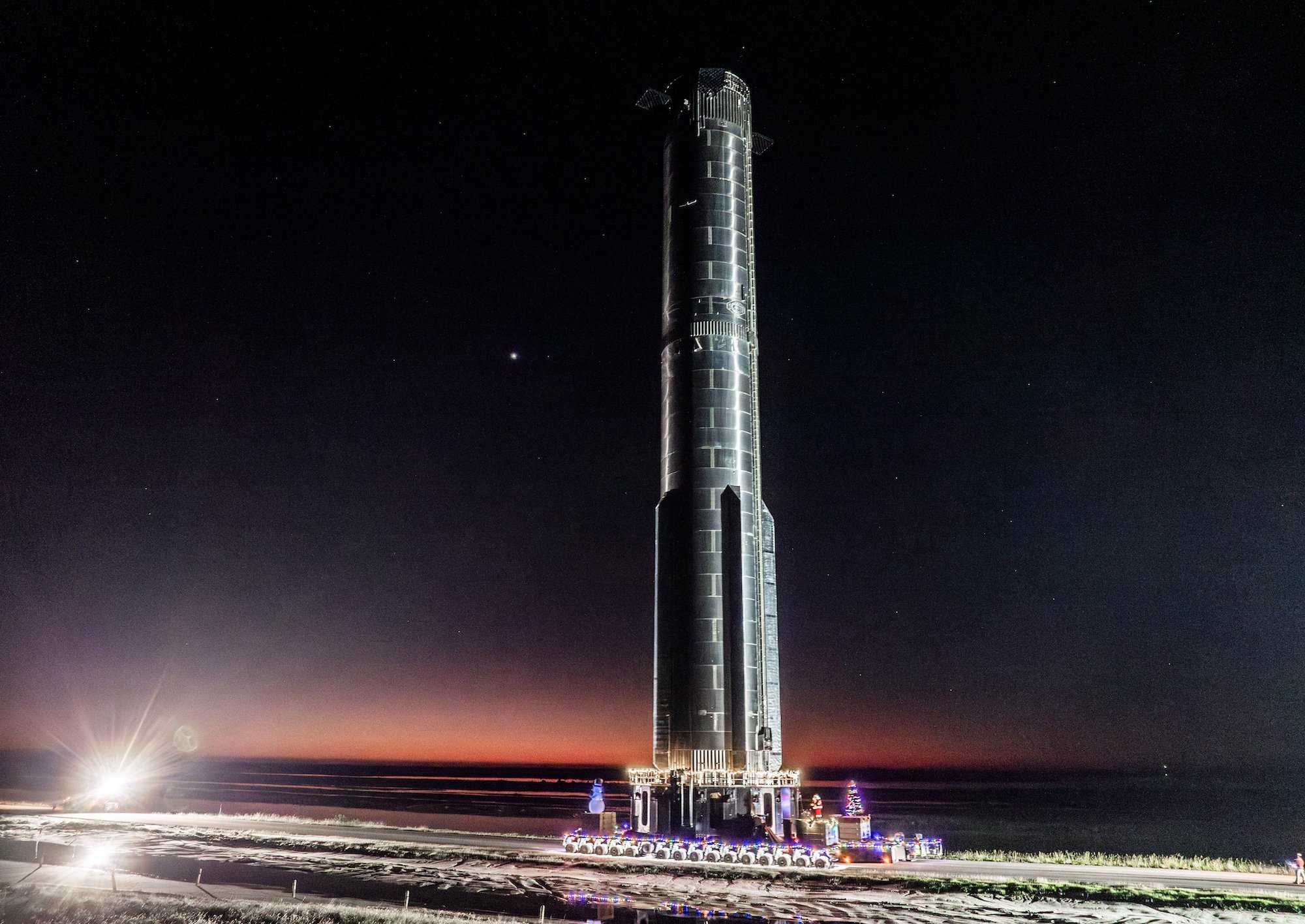 SpaceX's Super Heavy booster on its way to the launchpad.