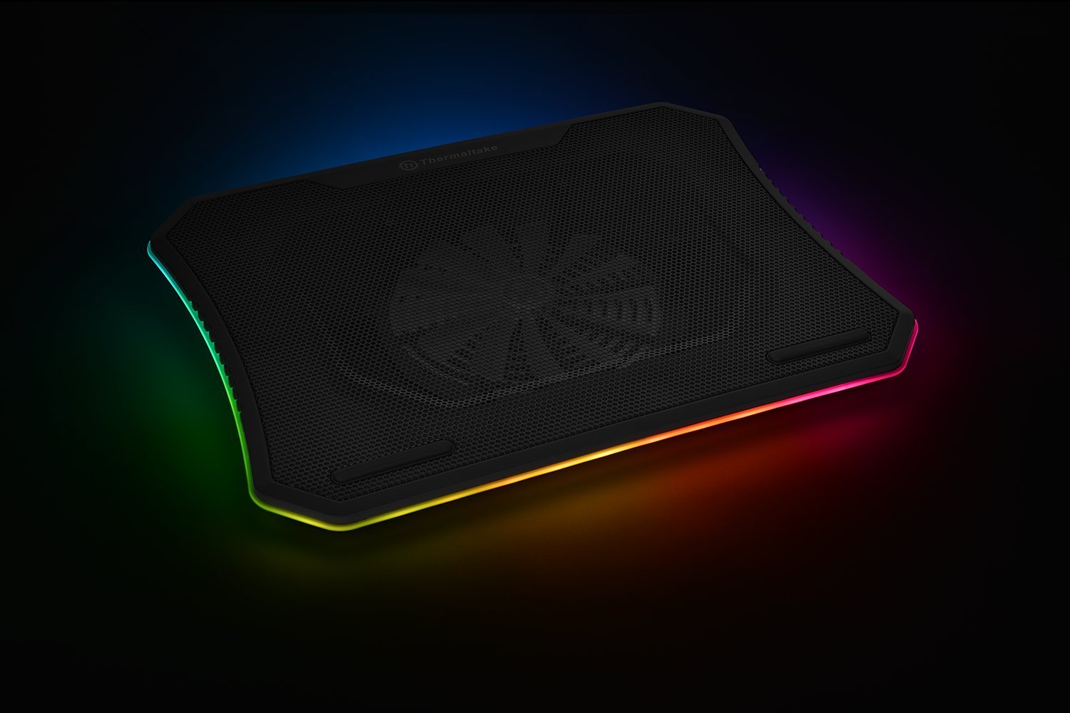Thermaltake laptop cooling pad with RGB lighting around it.