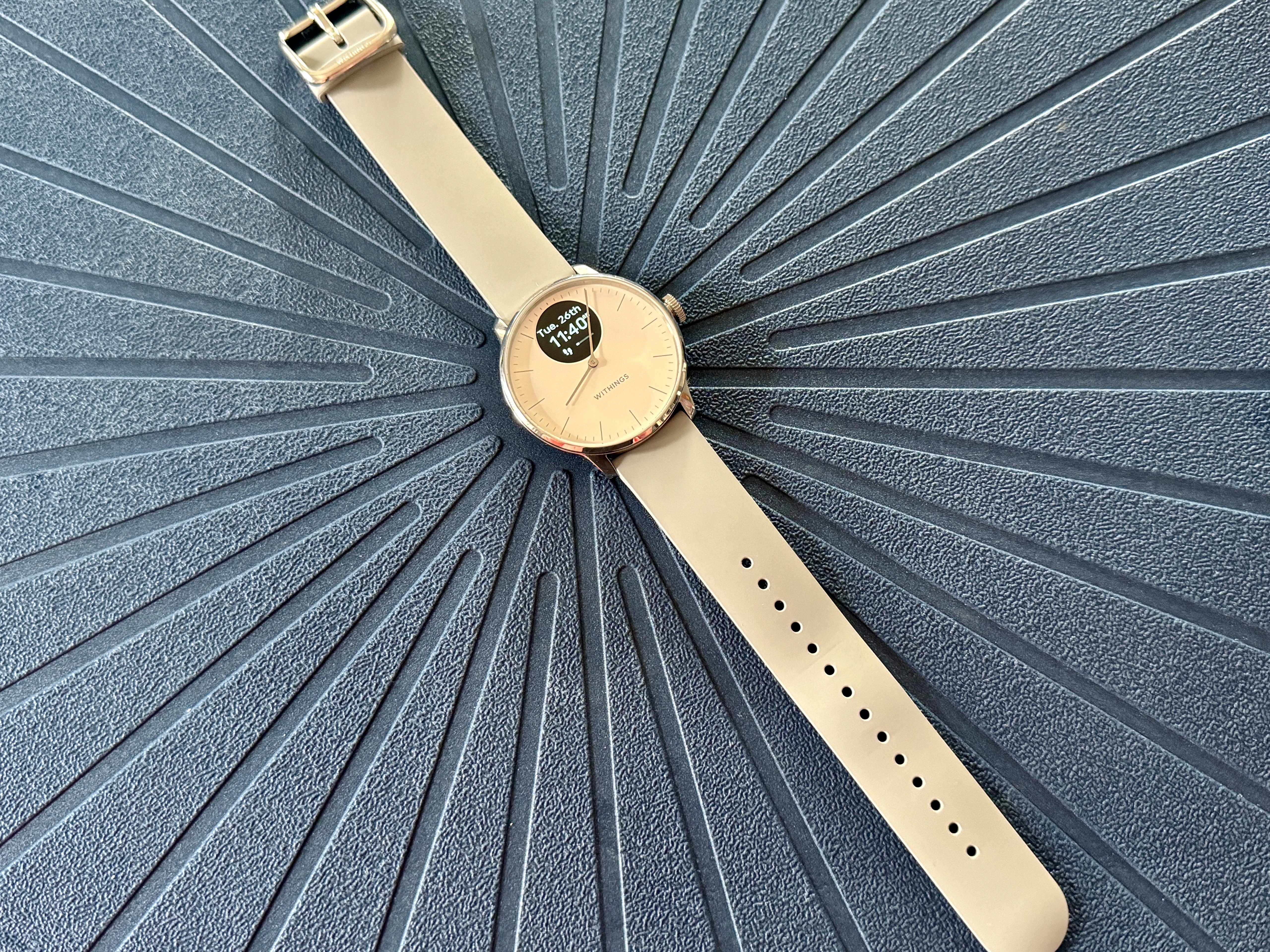 Withings ScanWatch Light laying flat.