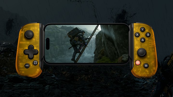 Sam Porter Bridges climbs a ladder in Death Stranding for iOS played on a limited edition Death Stranding Backbone One.