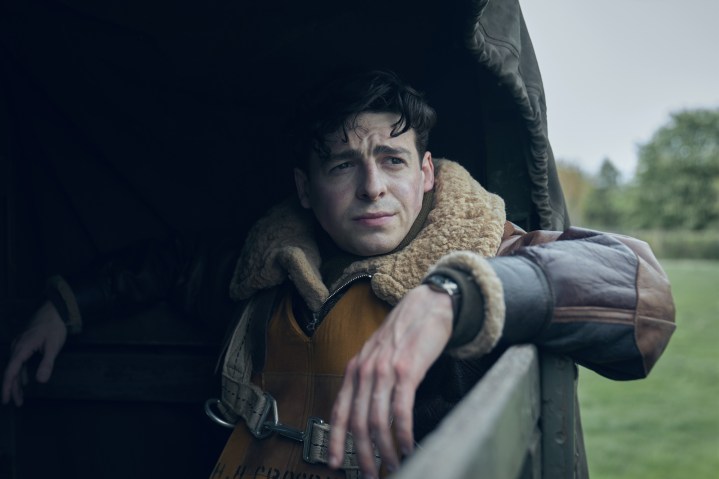 Anthony Boyle sits in the back of a military truck in Masters of the Air.