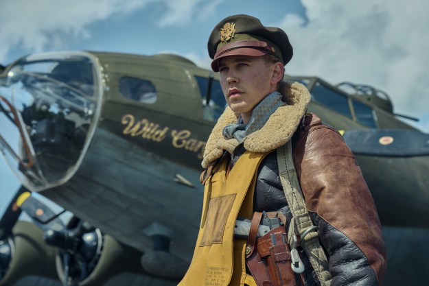 Austin Butler stands near a WWII plane in Masters of the Air.