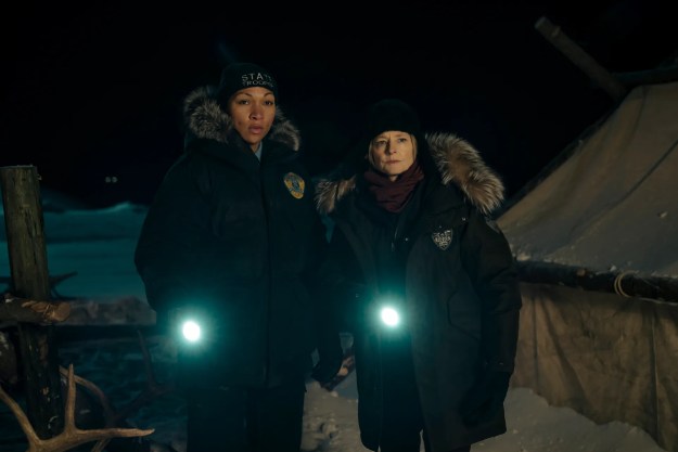 Kali Reis and Jodie Foster hold flashlights in True Detective: Night Country.