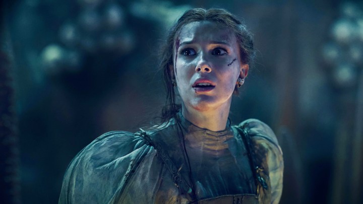 Millie Bobby Brown as Princess Eolide looking scared in Netflix's Damsel.