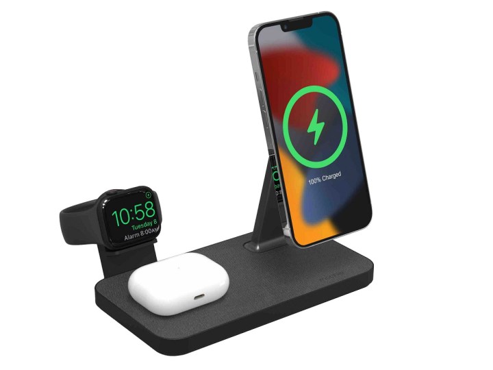 The Mophie Snap+ 3-in-1 Wireless Charging Stand with an iPhone, Apple Watch, and AirPods charging.