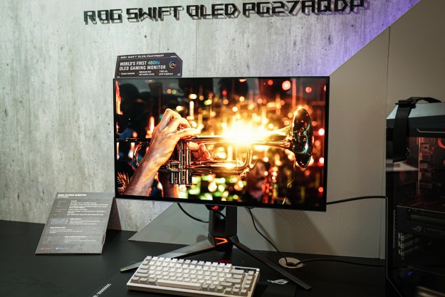 The Asus 480Hz OLED gaming monitor set up at a press event.
