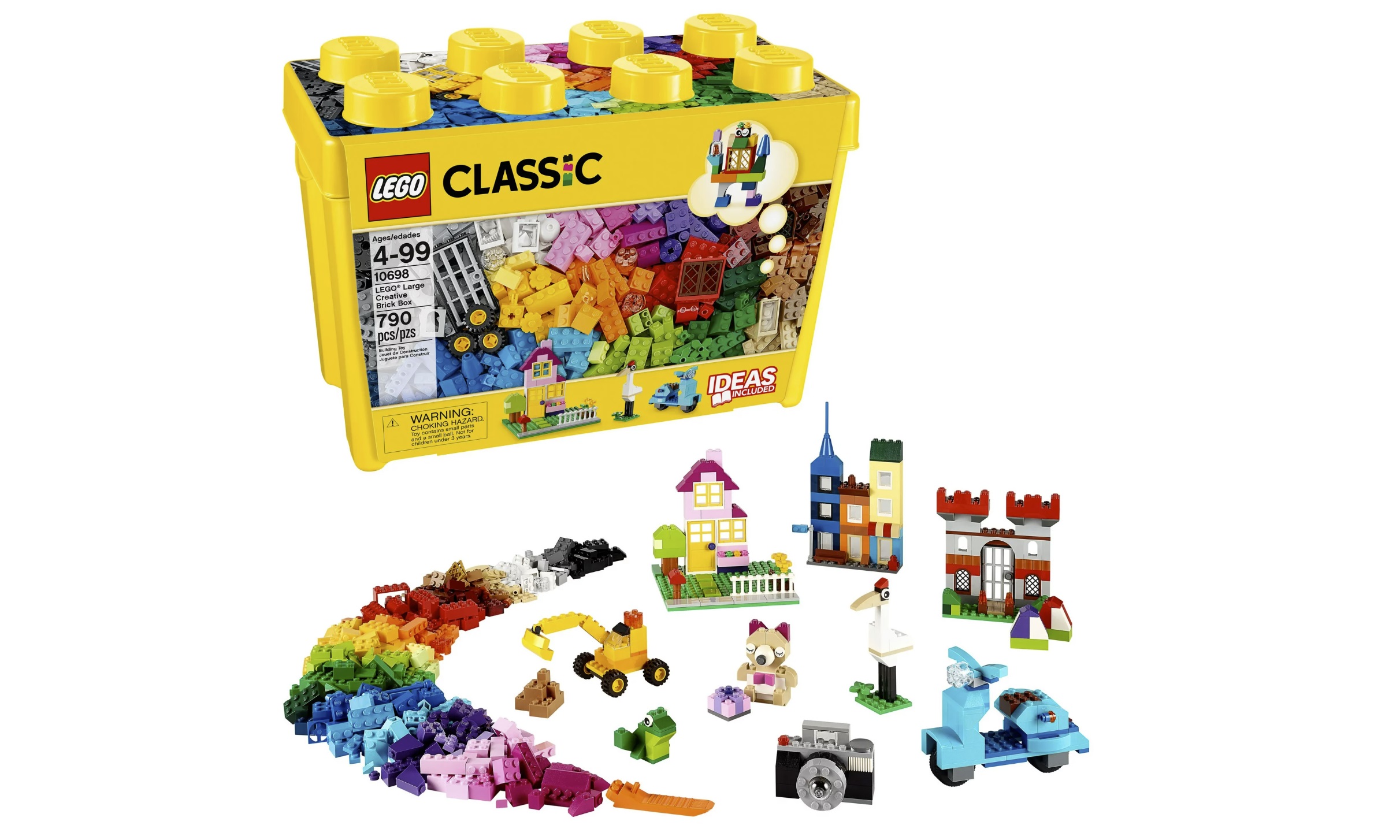 Lego box with some miscellaneous creations and blocks strewn about.