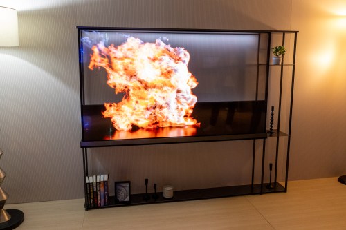 The LG Signature OLED T, with its contrast screen not quite halfway unfurled.