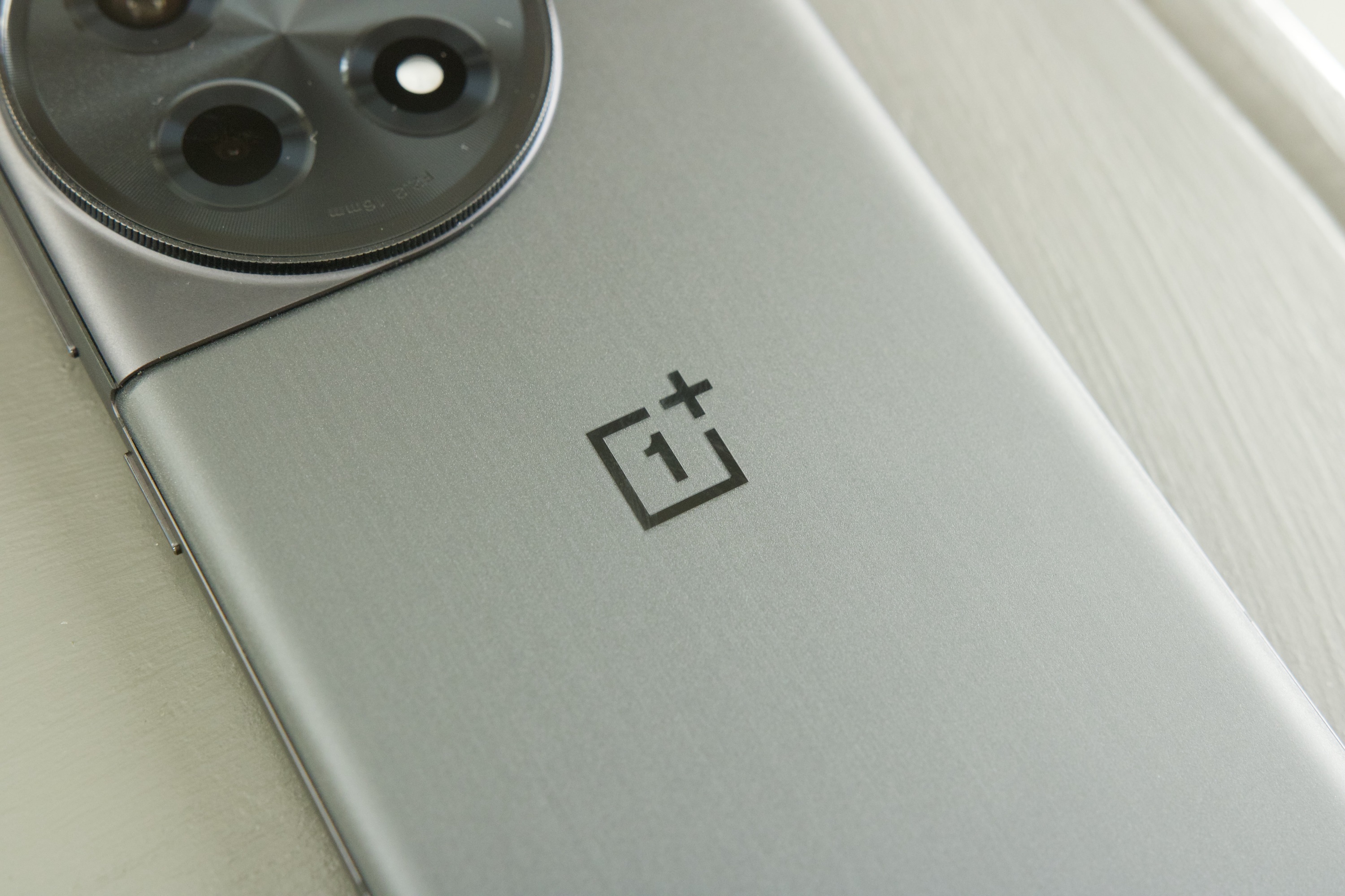 A close-up of the OnePlus logo on the OnePlus 12R.