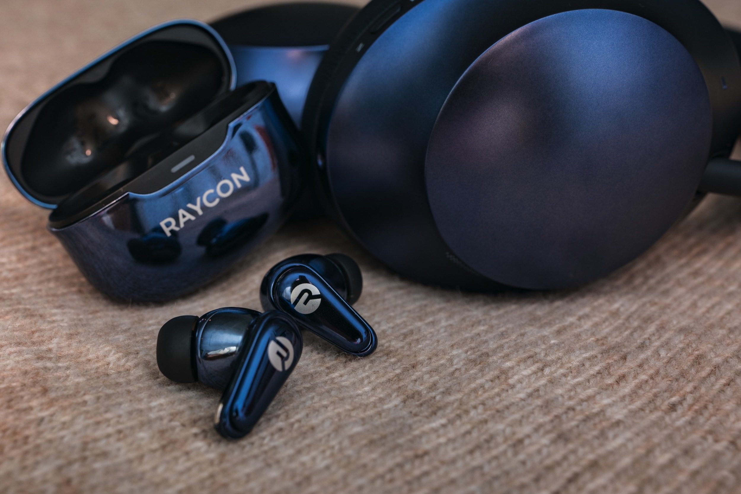 Raycon Everyday Pro earbuds and headphones.