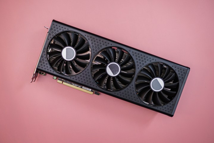 The RX 7600 XT graphics paper connected a pinkish background.