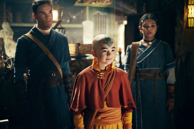 Aang stands with Sokka and Katara in Avatar: The Last Airbender.