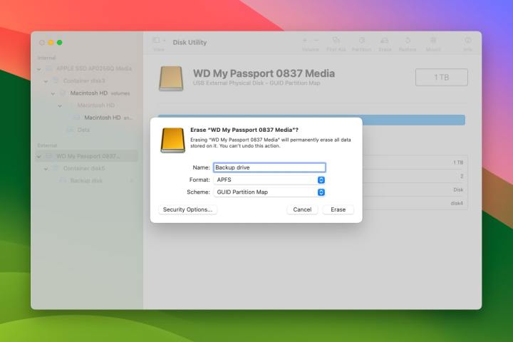 A user formats a drive using Disk Utility in macOS Sonoma.