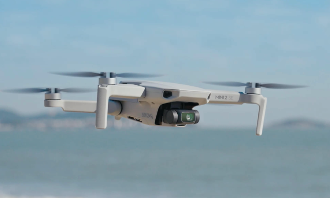 The DJI Mini 2 SE drone in flight.