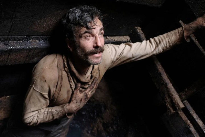 Daniel Day Lewis looks up a mineshaft in There Will Be Blood.
