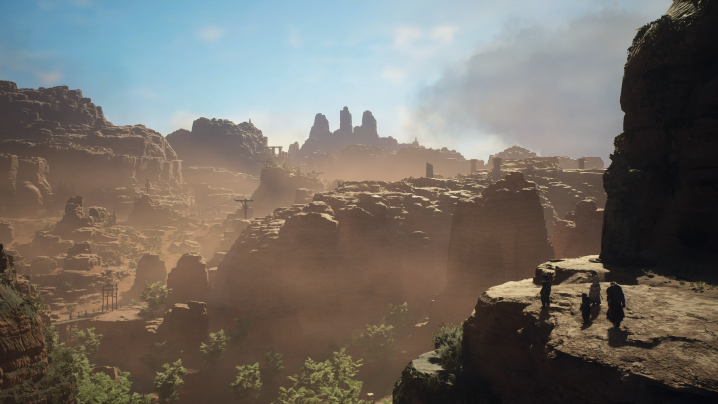 Characters look out over a canyon in Dragon's Dogma 2.