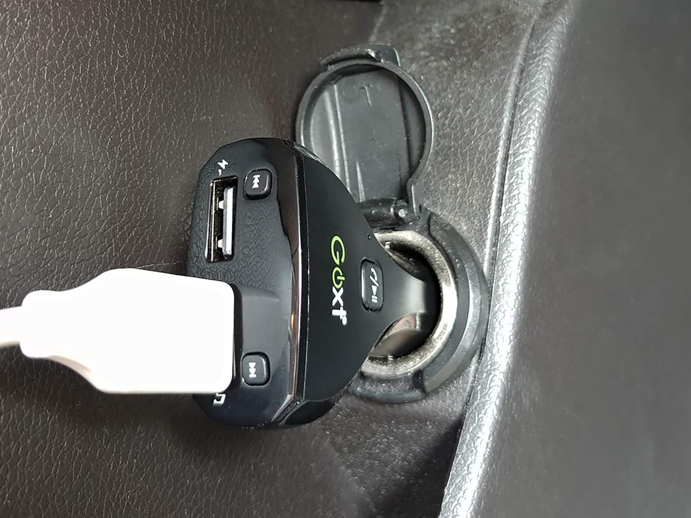 A GOXT Bluetooth transmitter in a car.