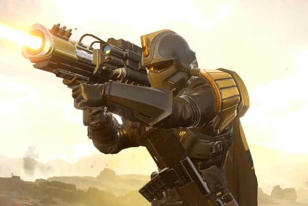 A Helldivers 2 player fires a laser canon.